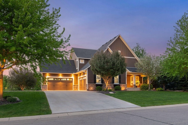2971 Fairway Dr, Chaska, MN 55318 - craftsman inspired home with an attached garage, a lawn, driveway, and stone siding