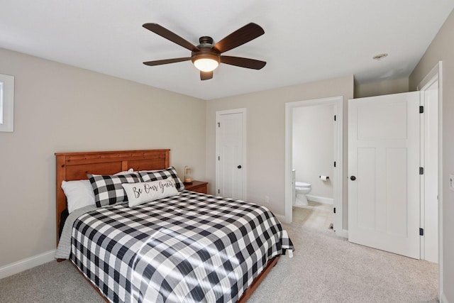 2971 Fairway Dr, Chaska, MN 55318 - bedroom with light carpet, baseboards, connected bathroom, and a ceiling fan