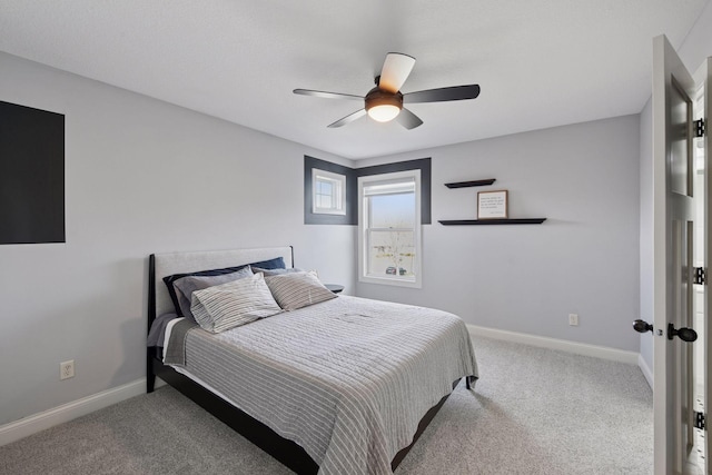 2971 Fairway Dr, Chaska, MN 55318 - carpeted bedroom featuring baseboards and a ceiling fan