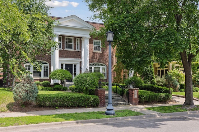 1785 Dupont Ave S, Minneapolis, MN 55403 - neoclassical home featuring brick siding and stairs