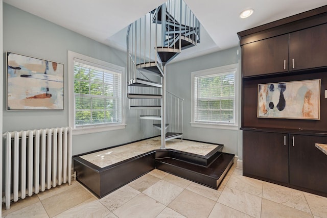 1785 Dupont Ave S, Minneapolis, MN 55403 - interior space with radiator heating unit, healthy amount of natural light, recessed lighting, and baseboards