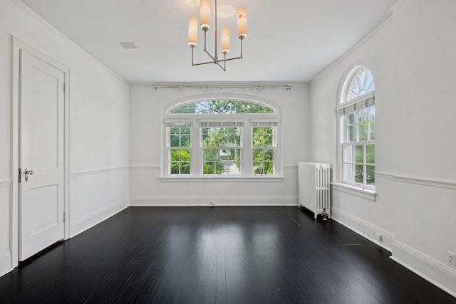 1785 Dupont Ave S, Minneapolis, MN 55403 - unfurnished room with radiator heating unit, a chandelier, healthy amount of natural light, dark wood-style flooring, and crown molding