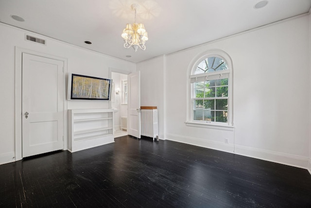 1785 Dupont Ave S, Minneapolis, MN 55403 - unfurnished living room with a chandelier, dark wood-type flooring, radiator heating unit, and baseboards