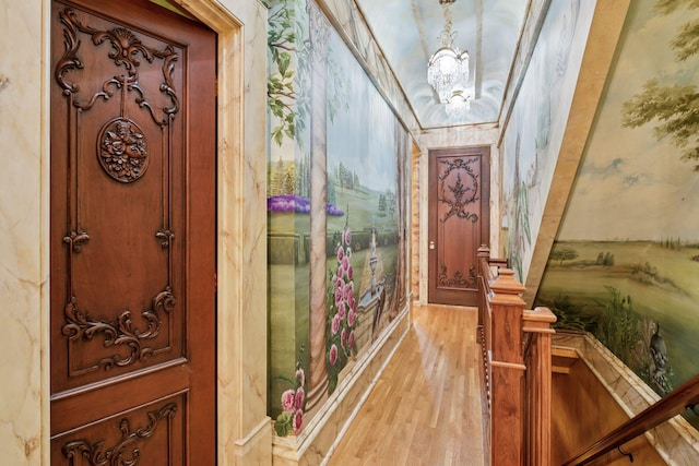 8 Grove St Unit 8B, Minneapolis, MN 55401 - corridor with light wood-style floors and a chandelier