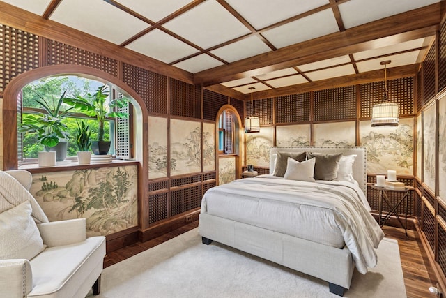 8 Grove St Unit 8B, Minneapolis, MN 55401 - bedroom with wood finished floors, wallpapered walls, and coffered ceiling