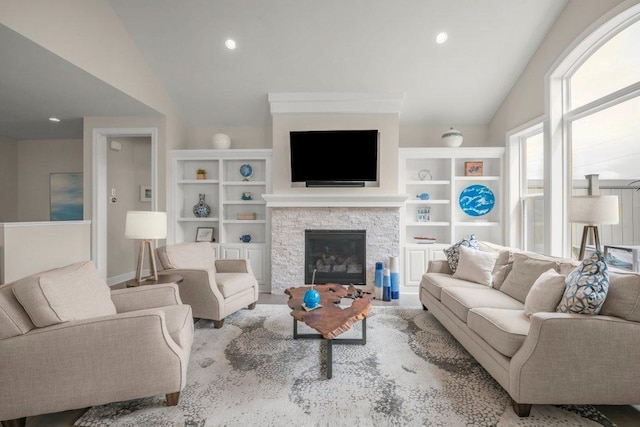 214 Byrondale Ave, Wayzata, MN 55391 - living room with vaulted ceiling, a fireplace, built in shelves, and recessed lighting