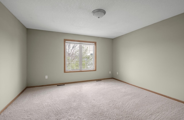 10543 Noble Cir N, Brooklyn Park, MN 55443 - empty room with carpet floors and baseboards