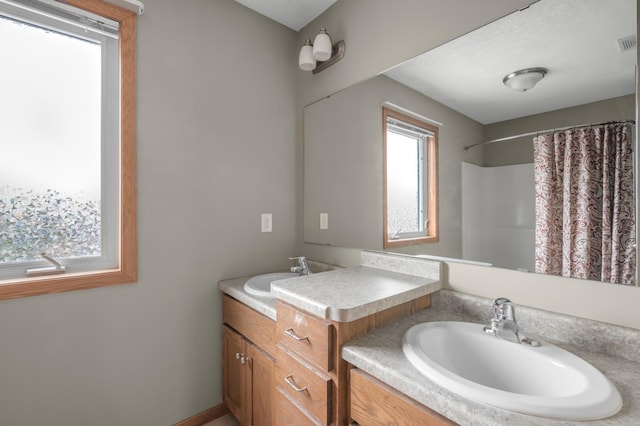 10543 Noble Cir N, Brooklyn Park, MN 55443 - bathroom with vanity and curtained shower