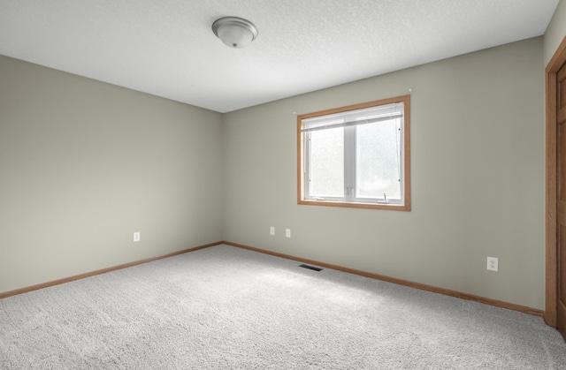 10543 Noble Cir N, Brooklyn Park, MN 55443 - carpeted empty room with baseboards