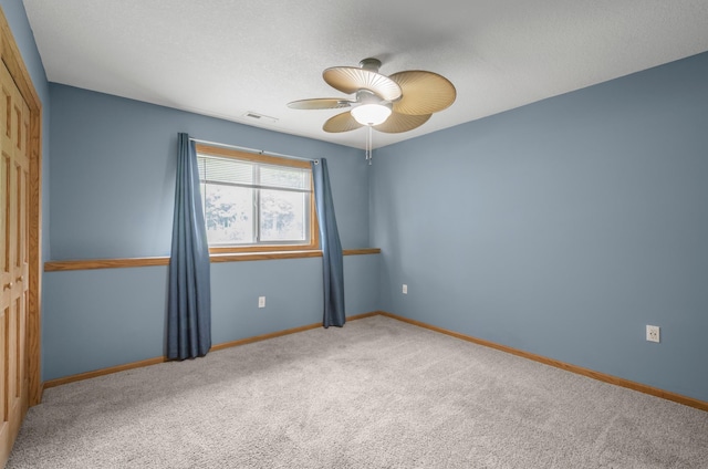10543 Noble Cir N, Brooklyn Park, MN 55443 - carpeted empty room with baseboards and ceiling fan