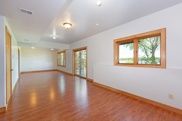 761 Country Lakes Dr, Lino Lakes, MN 55014 - spare room with baseboards and wood finished floors