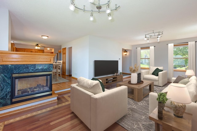 761 Country Lakes Dr, Lino Lakes, MN 55014 - living area featuring wood finished floors and a high end fireplace
