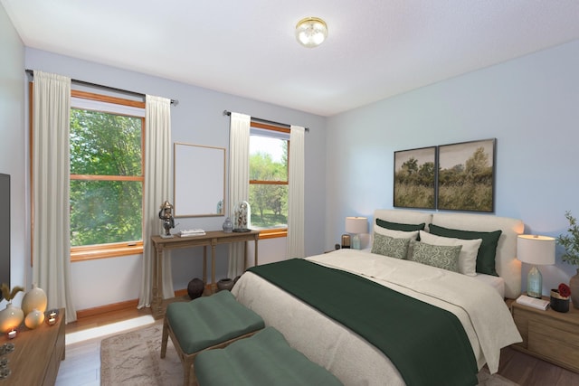 761 Country Lakes Dr, Lino Lakes, MN 55014 - bedroom with wood finished floors and baseboards