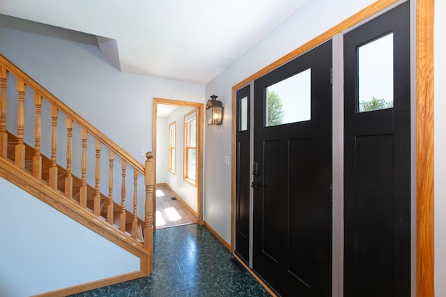 761 Country Lakes Dr, Lino Lakes, MN 55014 - foyer featuring tile patterned floors, stairs, and baseboards