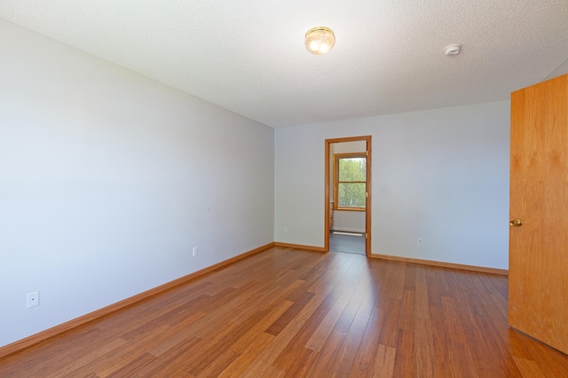 761 Country Lakes Dr, Lino Lakes, MN 55014 - spare room featuring light wood-style floors and baseboards