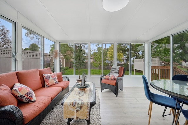 3807 Independence Ave N, New Hope, MN 55427 - sunroom / solarium with an outdoor living space, lofted ceiling, and outdoor dining area