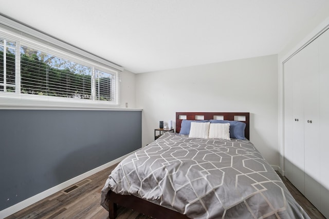 3807 Independence Ave N, New Hope, MN 55427 - bedroom featuring wood finished floors, a closet, and baseboards