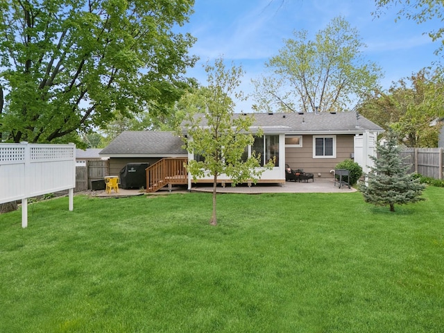 3807 Independence Ave N, New Hope, MN 55427 - rear view of house with a patio, a sunroom, and a wooden deck
