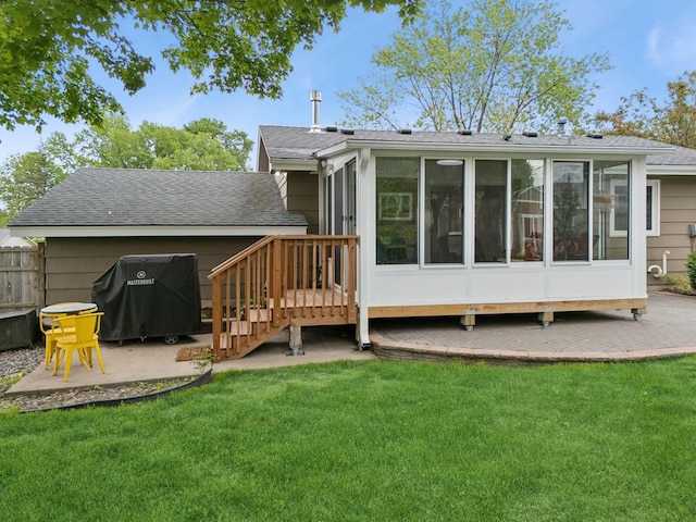 3807 Independence Ave N, New Hope, MN 55427 - back of property with a sunroom, a patio, and roof with shingles