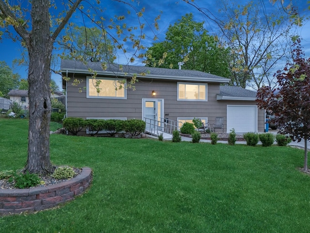 3807 Independence Ave N, New Hope, MN 55427 - view of front of property featuring a garage, a front lawn, and a shingled roof