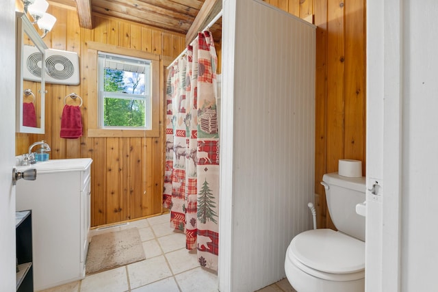 full bathroom featuring wood walls, toilet, vanity, and a shower with curtain