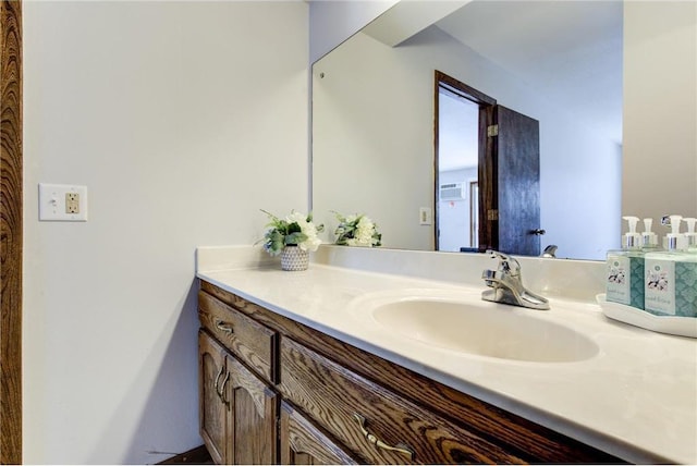709 11th Ave S Unit 5, Hopkins, MN 55343 - bathroom featuring vanity and an AC wall unit