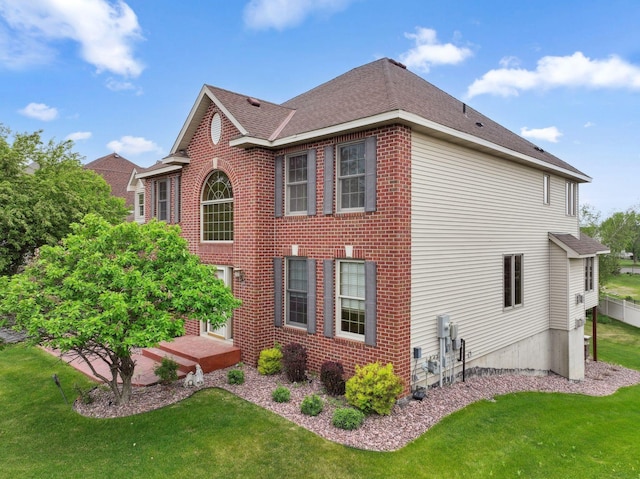 3613 Clare Downs Path, Rosemount, MN 55068 - view of side of home featuring a lawn, brick siding, and roof with shingles