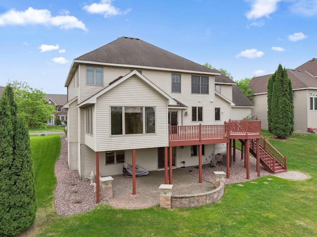 3613 Clare Downs Path, Rosemount, MN 55068 - rear view of house with a patio area, a yard, a wooden deck, stairs, and a shingled roof