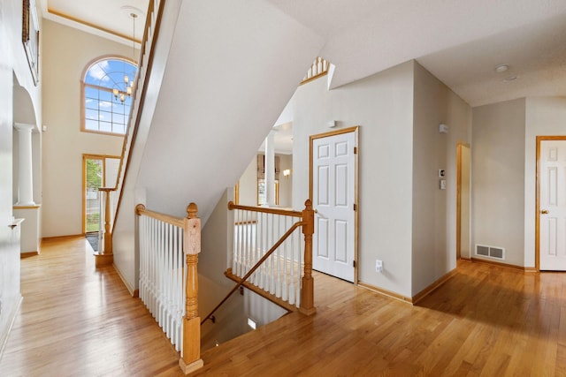 3613 Clare Downs Path, Rosemount, MN 55068 - hallway featuring an upstairs landing, light wood-style flooring, and baseboards