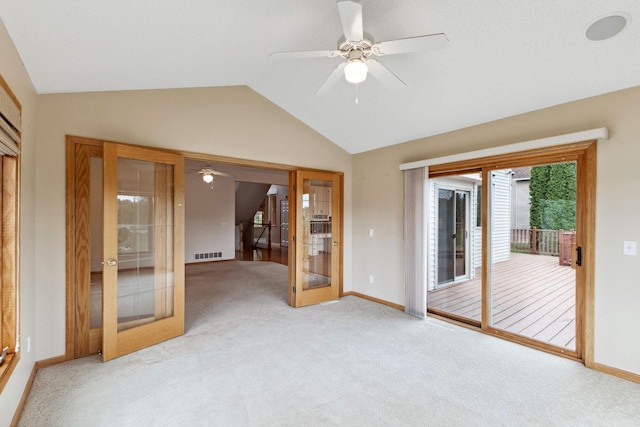 3613 Clare Downs Path, Rosemount, MN 55068 - empty room featuring lofted ceiling, french doors, ceiling fan, carpet flooring, and baseboards