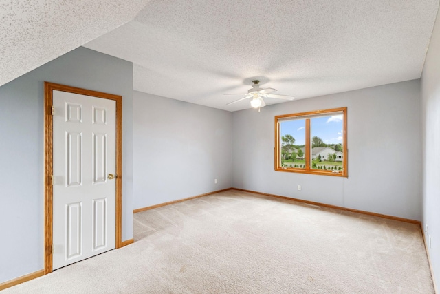 3613 Clare Downs Path, Rosemount, MN 55068 - unfurnished bedroom with carpet, baseboards, a textured ceiling, and a ceiling fan
