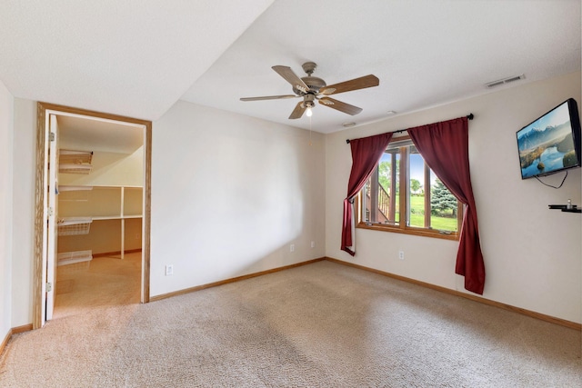 3613 Clare Downs Path, Rosemount, MN 55068 - spare room featuring carpet flooring, a ceiling fan, and baseboards