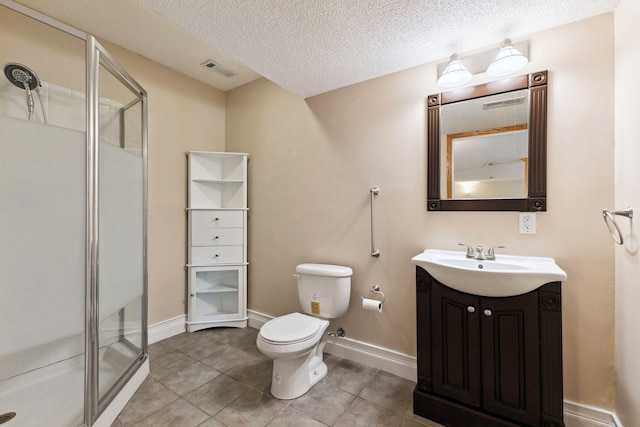 3613 Clare Downs Path, Rosemount, MN 55068 - bathroom with a shower stall, a textured ceiling, vanity, toilet, and baseboards