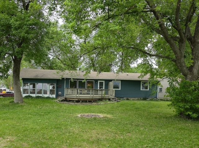 214 Central Ave, Truman, MN 56088 - back of house with a yard and a wooden deck