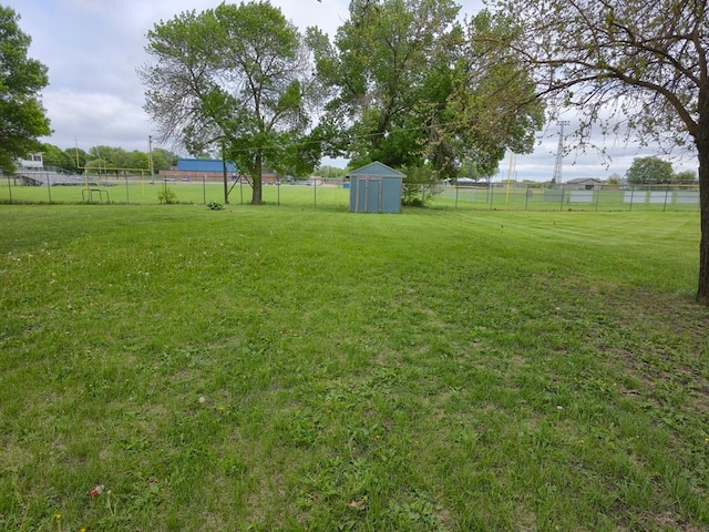 214 Central Ave, Truman, MN 56088 - view of yard with a storage shed and an outdoor structure