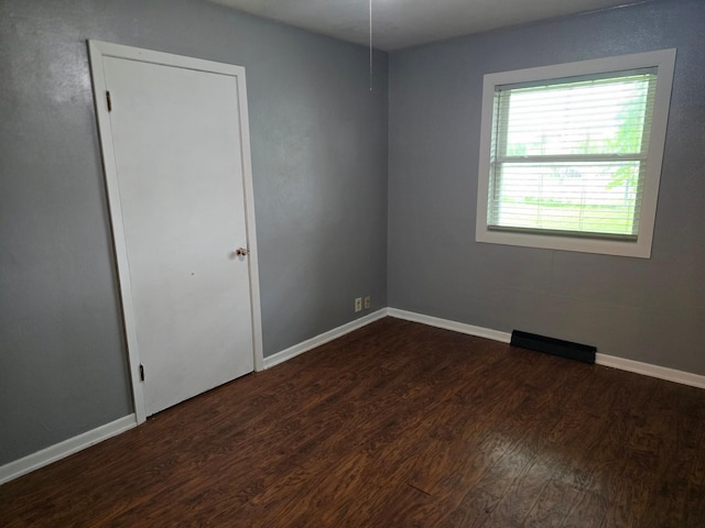 214 Central Ave, Truman, MN 56088 - empty room featuring wood finished floors and baseboards