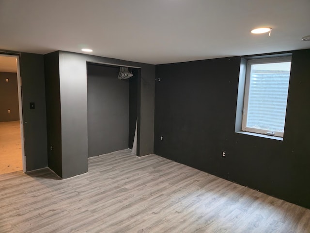 214 Central Ave, Truman, MN 56088 - below grade area with light wood-style flooring