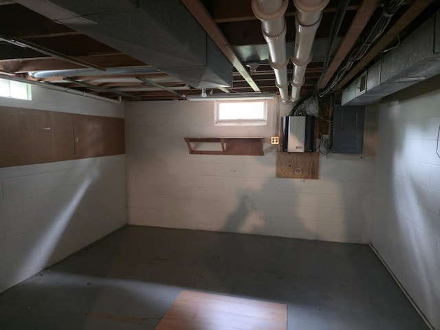214 Central Ave, Truman, MN 56088 - below grade area featuring electric panel and concrete block wall