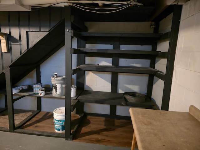 214 Central Ave, Truman, MN 56088 - stairway featuring concrete block wall