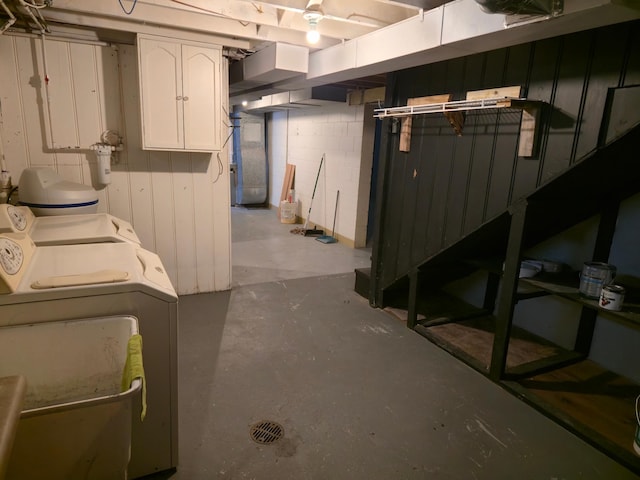 214 Central Ave, Truman, MN 56088 - unfinished below grade area with washing machine and dryer and a water softener