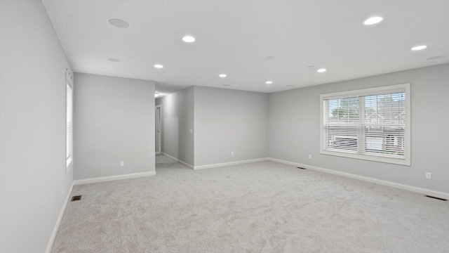 15365 Eagle Creek Way, Apple Valley, MN 55124 - empty room featuring light colored carpet, recessed lighting, and baseboards