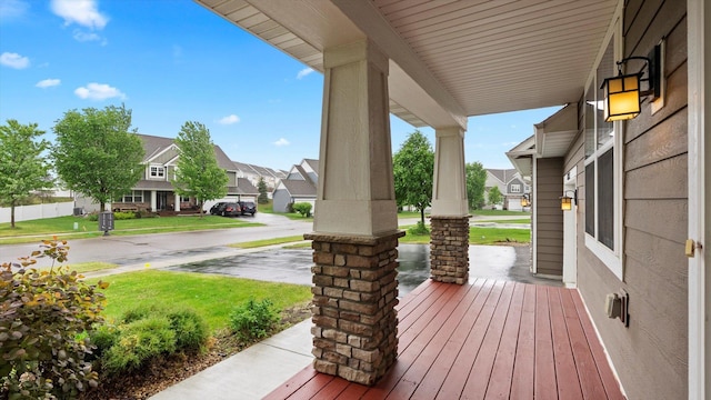 15365 Eagle Creek Way, Apple Valley, MN 55124 - wooden terrace featuring a porch and a residential view