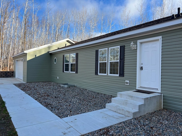 view of front of home featuring an attached garage
