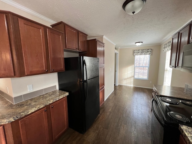 kitchen with black appliances, dark wood finished floors, crown molding, a textured ceiling, and dark stone counters