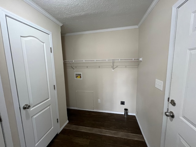 washroom featuring washer hookup, dark wood finished floors, baseboards, a textured ceiling, and ornamental molding
