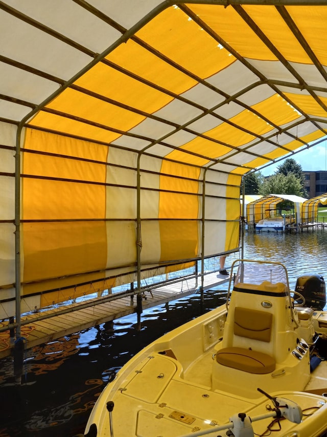 5450 Three Points Blvd Unit 623, Mound, MN 55364 - dock area with boat lift and a water view