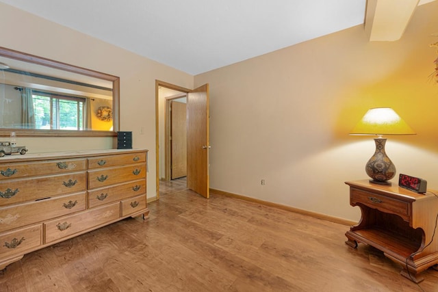 5450 Three Points Blvd Unit 623, Mound, MN 55364 - bedroom with light wood-style flooring and baseboards