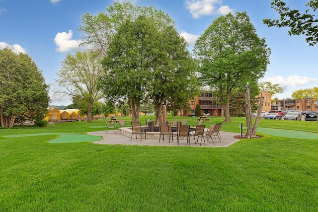 5450 Three Points Blvd Unit 623, Mound, MN 55364 - view of grassy yard featuring a patio area