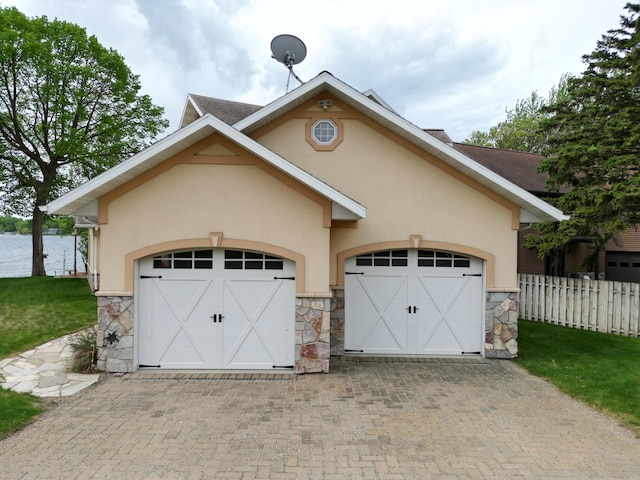14620 Thomas Rd, Lake Park, MN 56554 - garage featuring fence and driveway