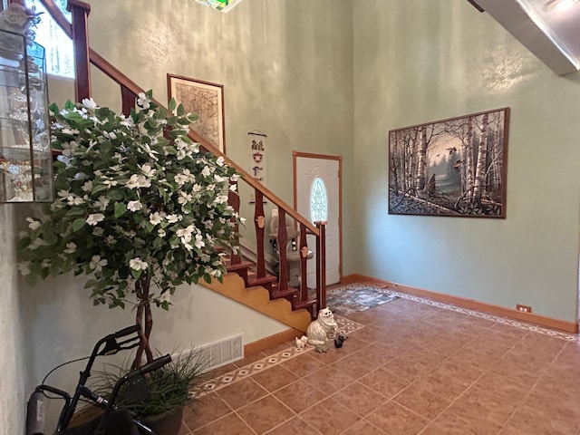 14620 Thomas Rd, Lake Park, MN 56554 - foyer with stairway, baseboards, and a towering ceiling